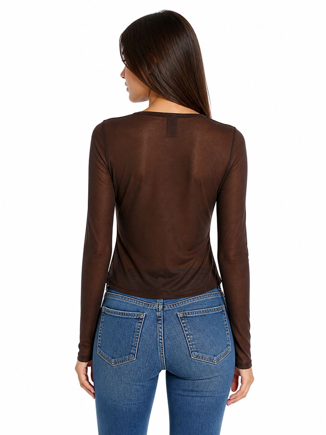 Woman wearing a brown long-sleeve sheer mesh top and blue jeans on a white background